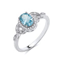 STERLING SILVER SIMULATED BLUE TOPAZ & CZ RING