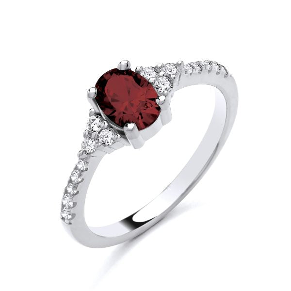 STERLING SILVER OVAL SOLITAIRE SIMULATED RUBY & CZ RING