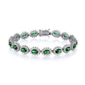 STERLING SILVER SIMULATED EMERALD & CZ OVAL HALO BRACELET – 7.5 INCH