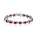 STERLING SILVER SIMULATED RUBY & CZ OVAL HALO BRACELET – 7.5 INCH